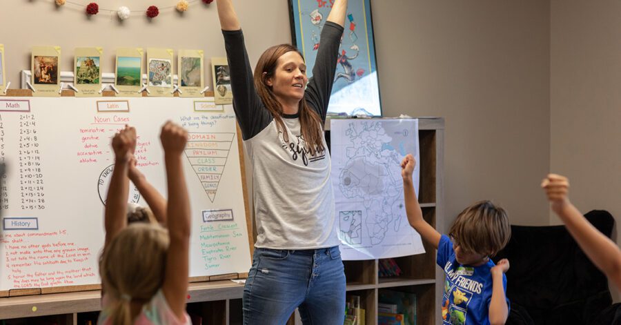 A homeschool teacher having fun with her class.