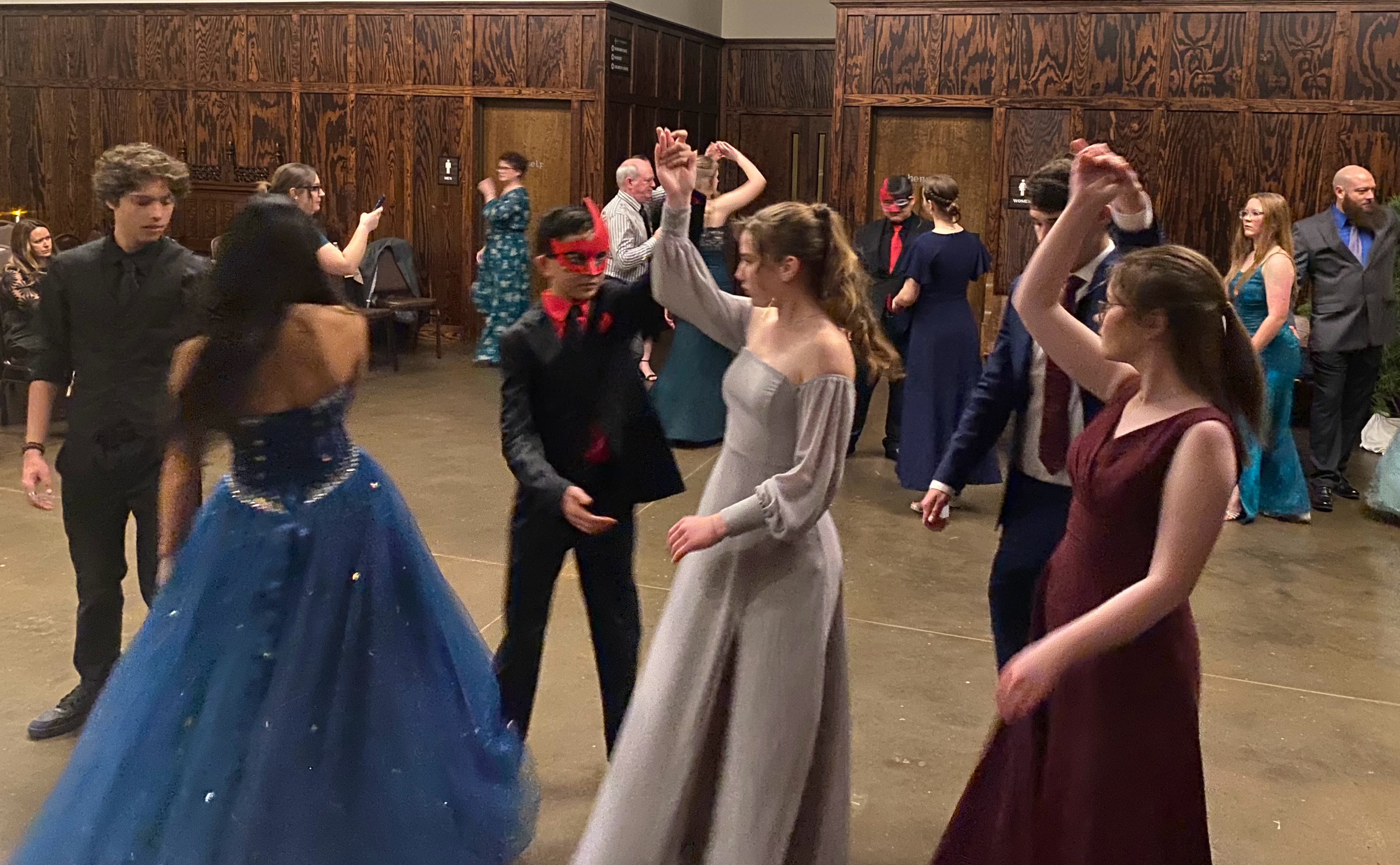 Students learning a ballroom dance at CC Protocol