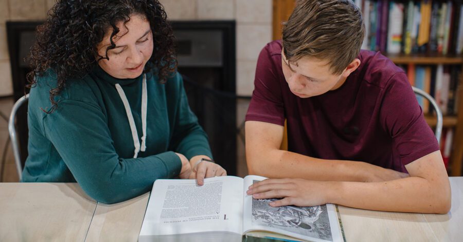 A homeschool mother and son discussing why learn Latin