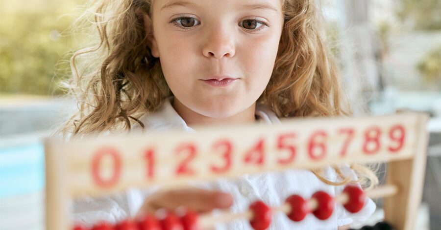 homeschool student using an abacus.