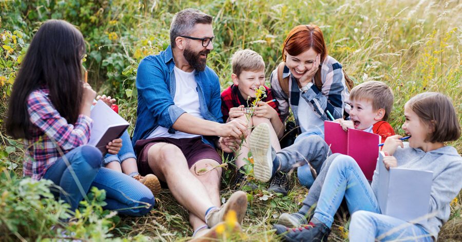 Homeschool Family enjoying a nice summer day in a field.