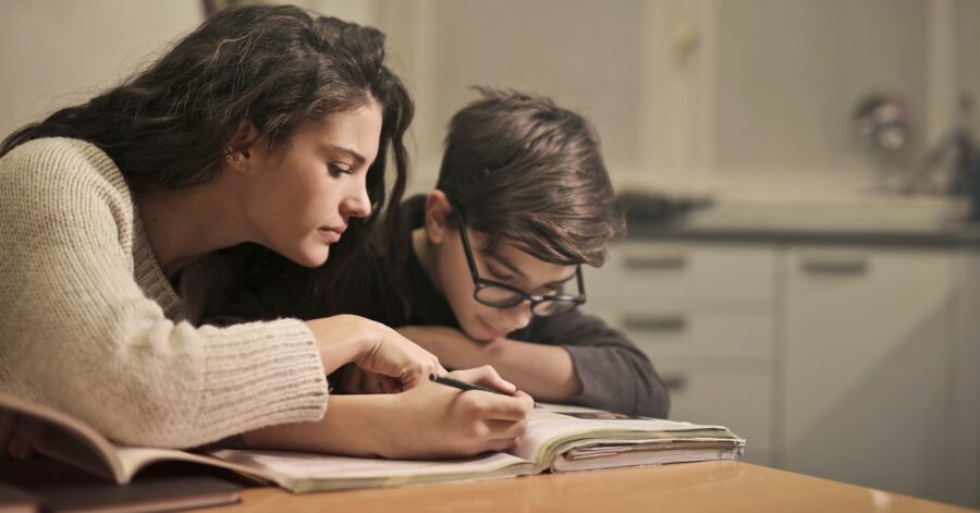 Why Math Is Important: A mom and a son study math together.