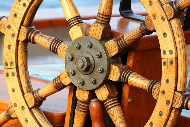 Old wooden ship steering wheel