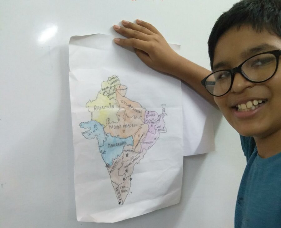 a homeschool student shows a map drawing of India
