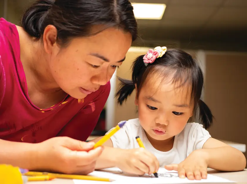 A mom and daughter learn together.