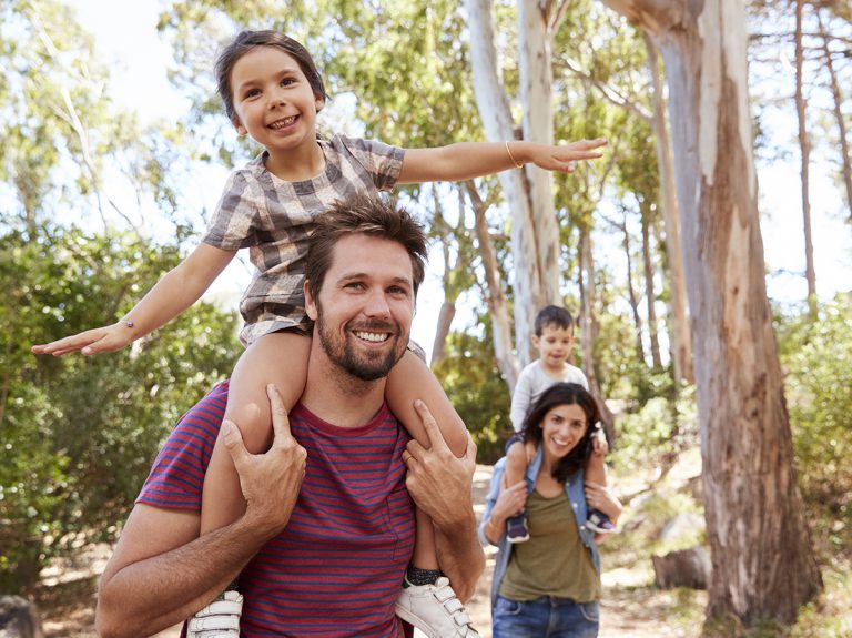 Family taking a walk on trails