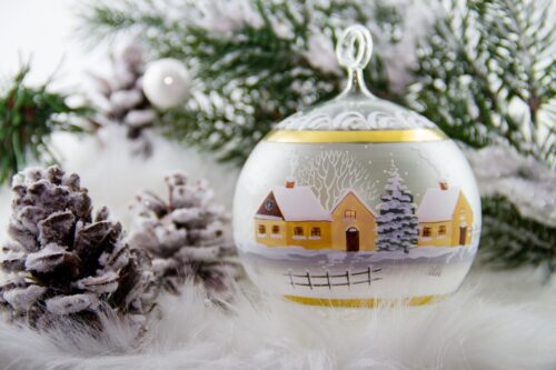 A painted glass Christmas ornament.