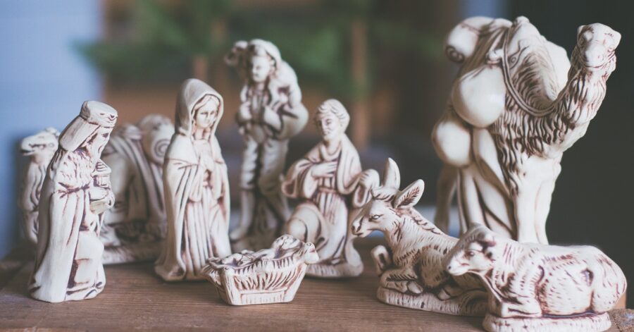 Nativity figurines: Mary, Joseph, Jesus, and the magi.