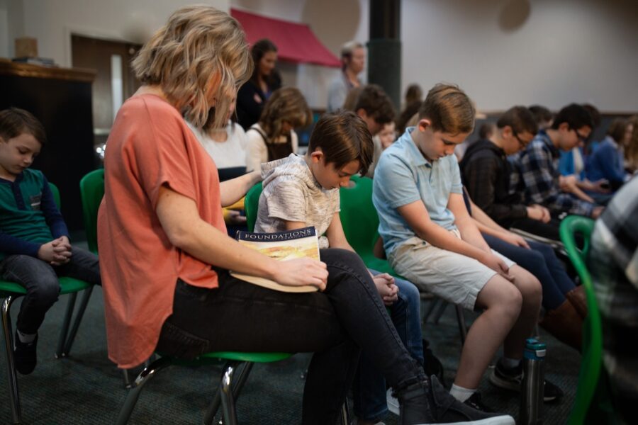 Classical Conversations families praying