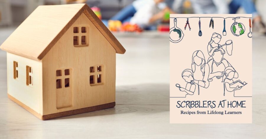 A model house next to the Scribblers at Home cover.