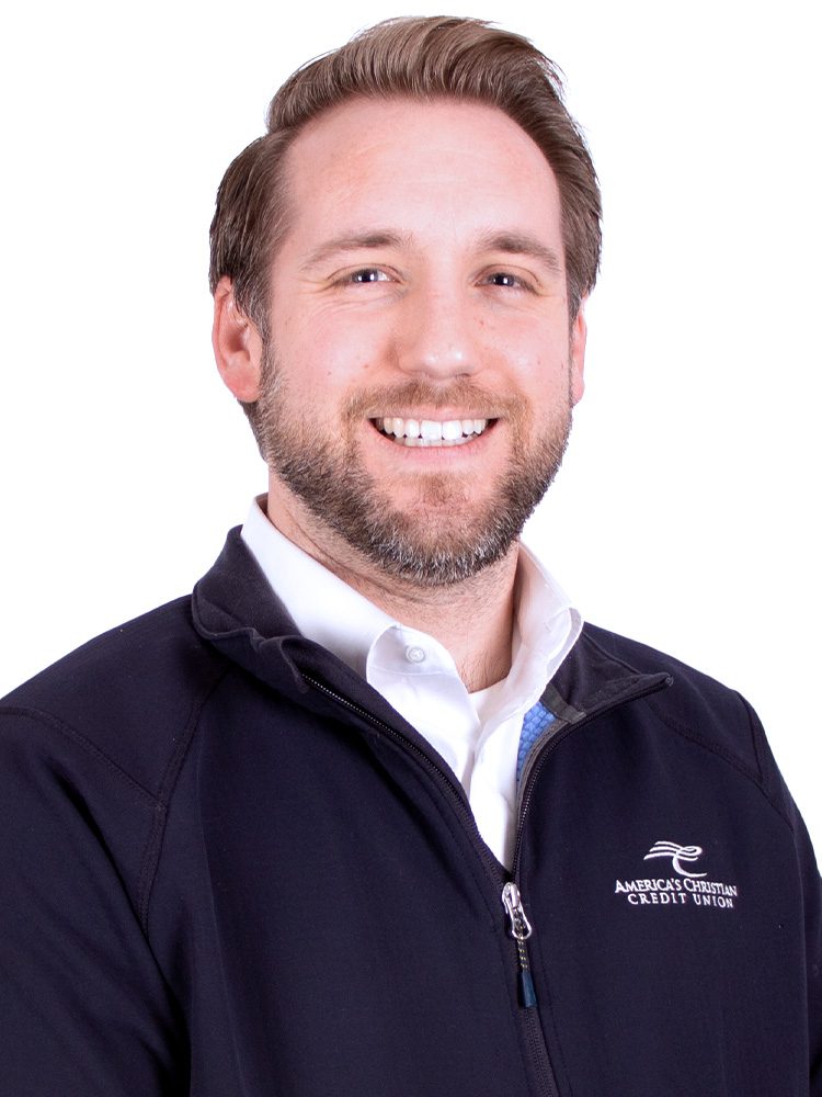 Headshot of man in blue pullover. Frank Clement from American Christian Credit Union