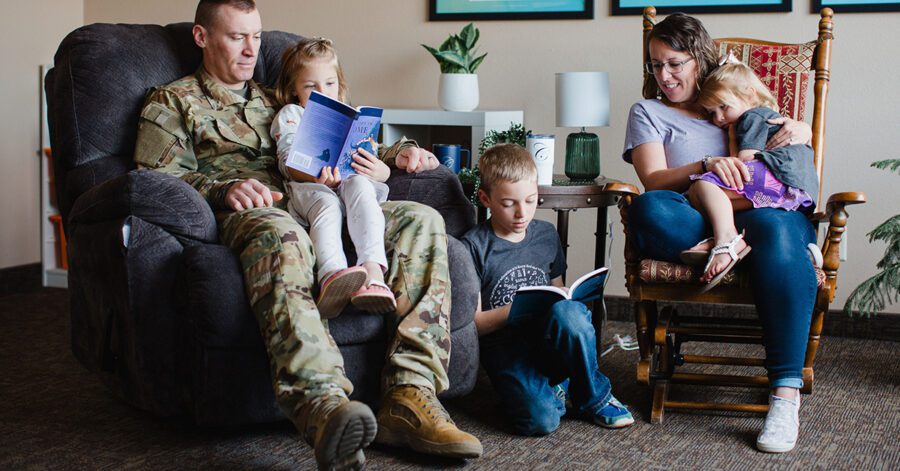 homeschool family sitting and reading together