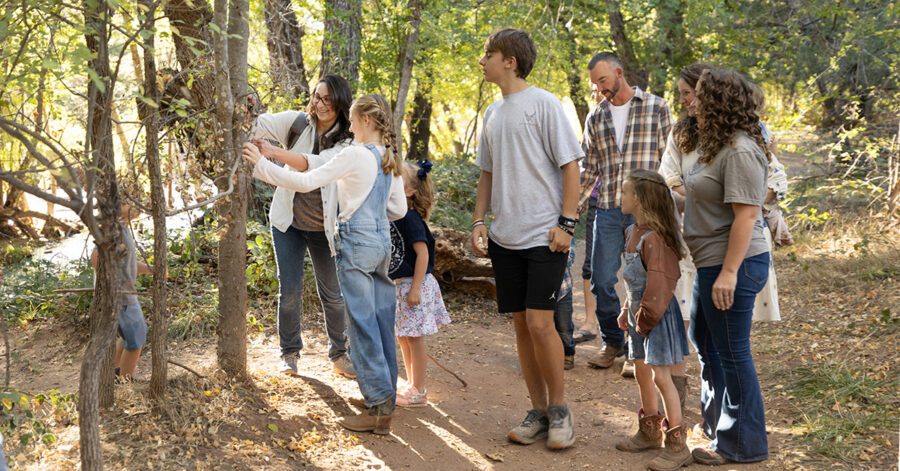 Homeschool group activities with parents and students exploring nature