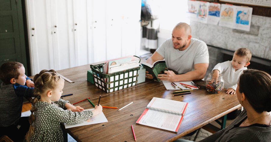 Stay at home homeschool dad teaching is children