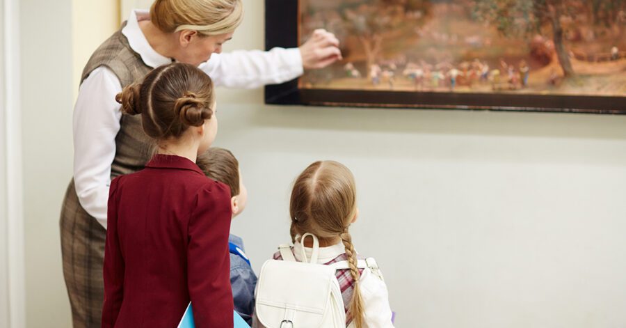 Homeschool students studying and finding God in art