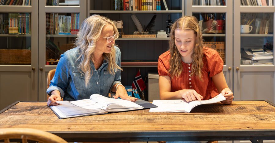 Homeschool mom helps her daughter research for her Senior Thesis