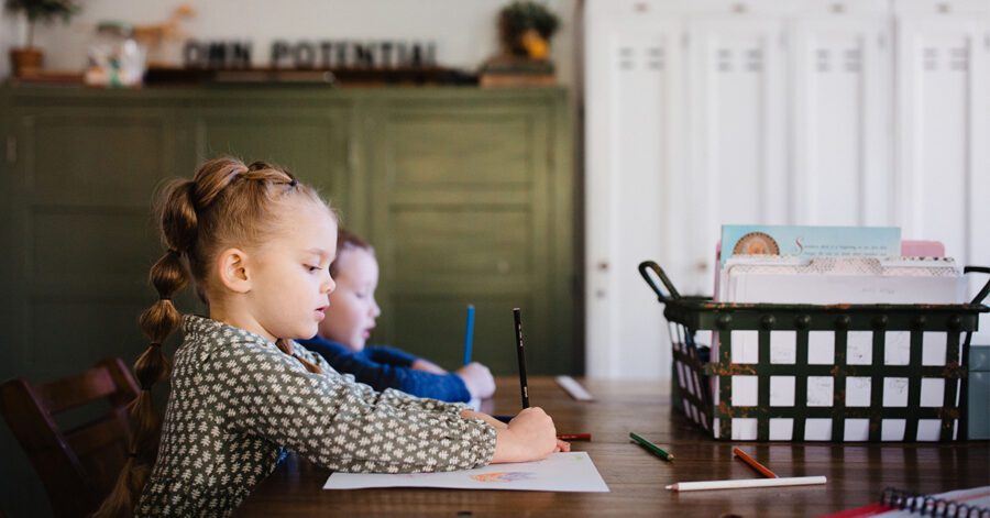 Homeschool children using decodable readers to help build fluency