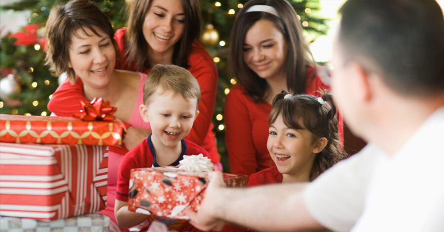 family receiving homeschool gifts at Christmas