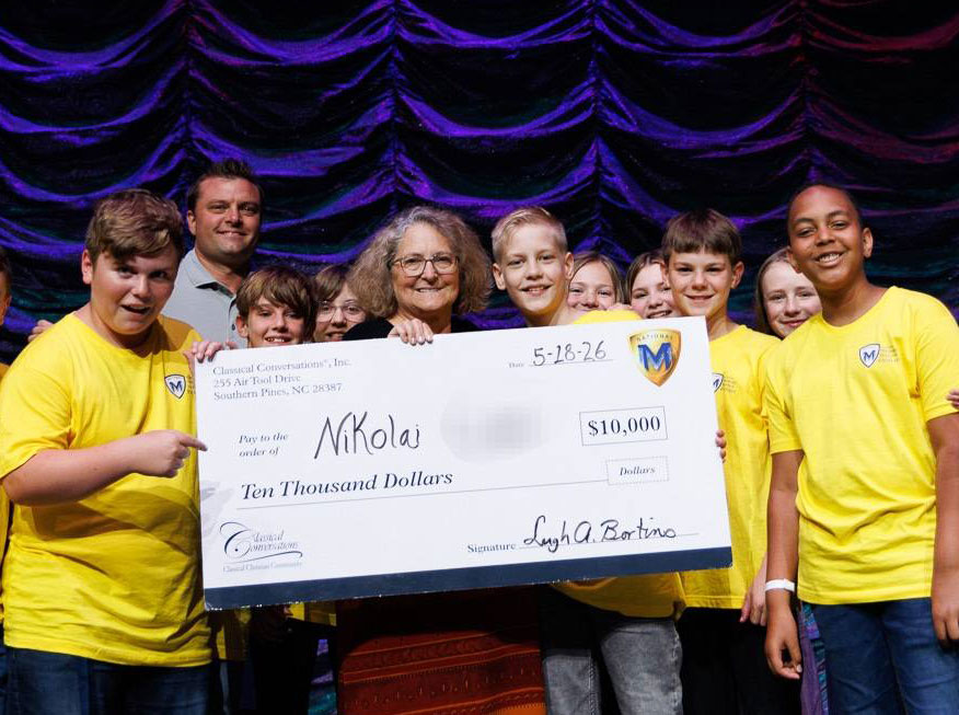 National Memory Masters 2027 winner with check and Leigh and Robert Bortins
