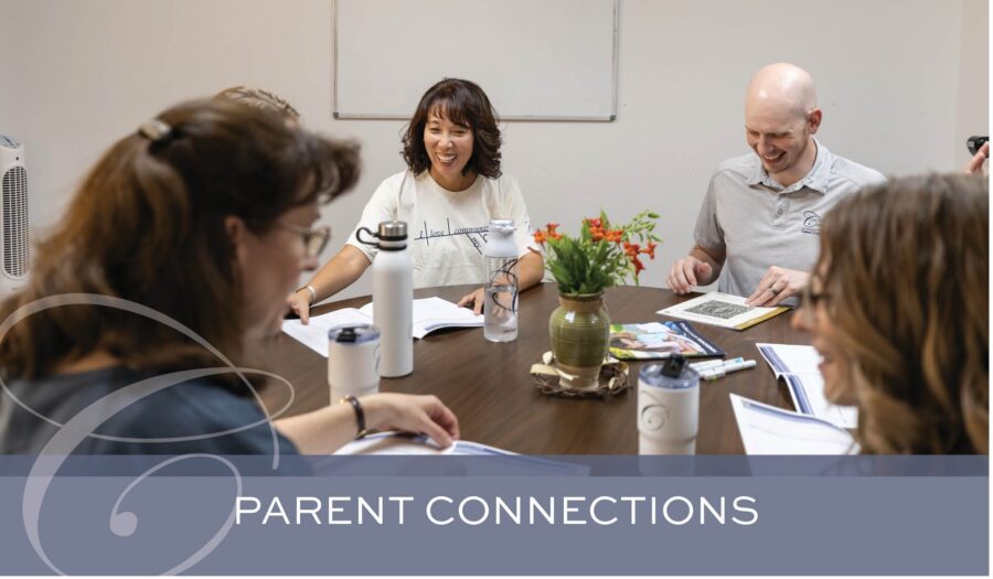 Classical Conversations parents in a Parent Connections community meeting.