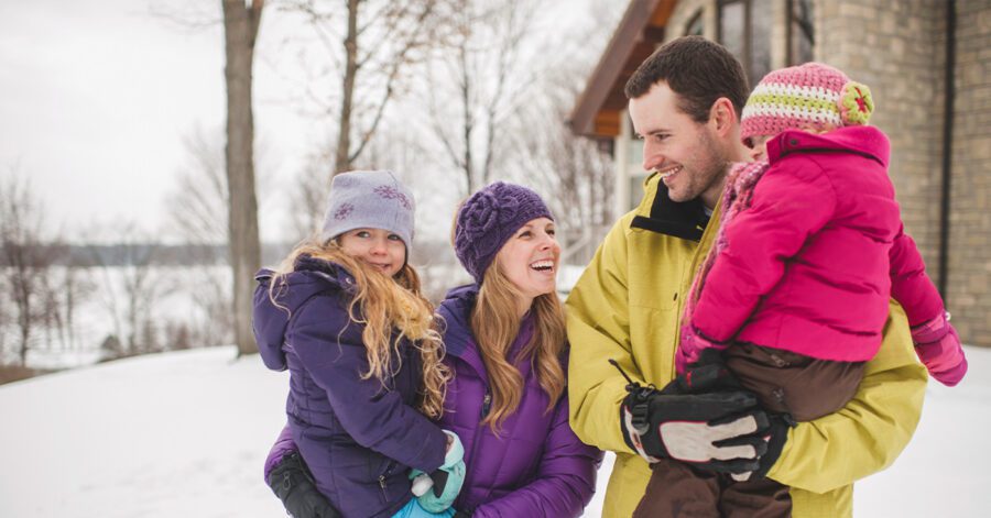 Homeschool family outside in winter creating Advent traditions together